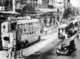 China: Shanghai traffic - bus, tram and automobile - on Nanjing Road, c.1930